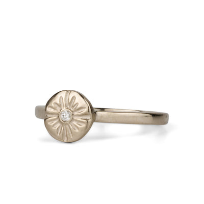 Lucia Small White Gold and Diamond Ring side angle on a white background 