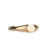 Low profile gold signet ring with hexagon top and engraved single block "F" initial