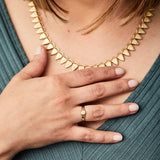 Gold low profile signet ring with a hexagon face 