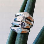 Low profile silver signet ring with hexagon top and engraved single block initial