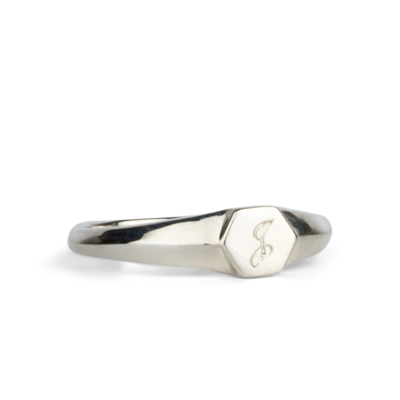 Low profile sterling silver signet ring with hexagon top and engraved single script "J" initial