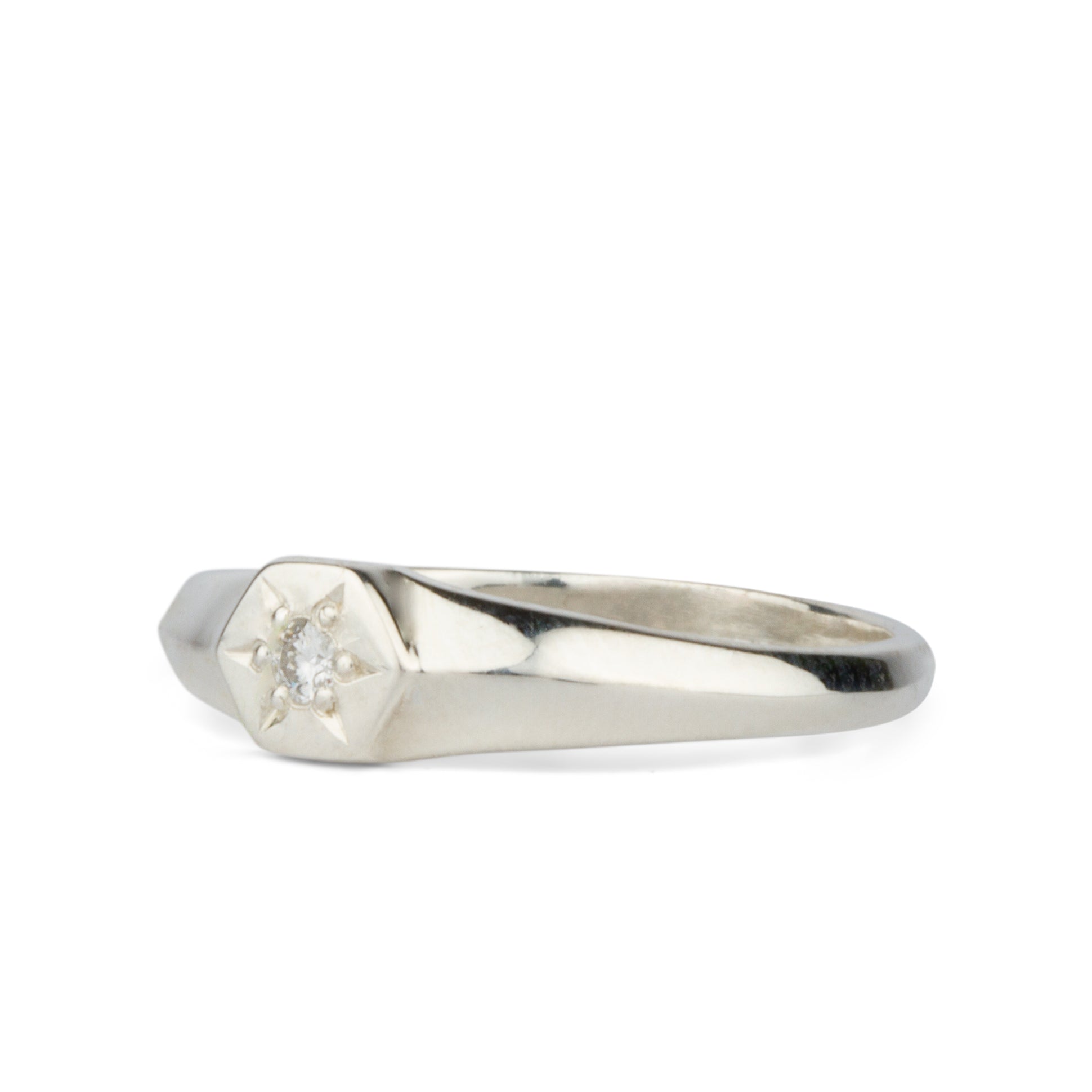 Silver and Diamond Star Astra Signet Ring side view on a white background