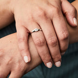 Silver and Diamond Star Astra Signet Ring on a hand