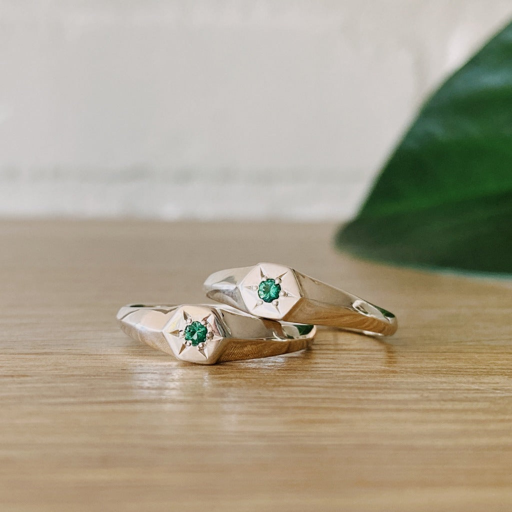 sterling silver hexagon signet rings with star set emeralds in the center 