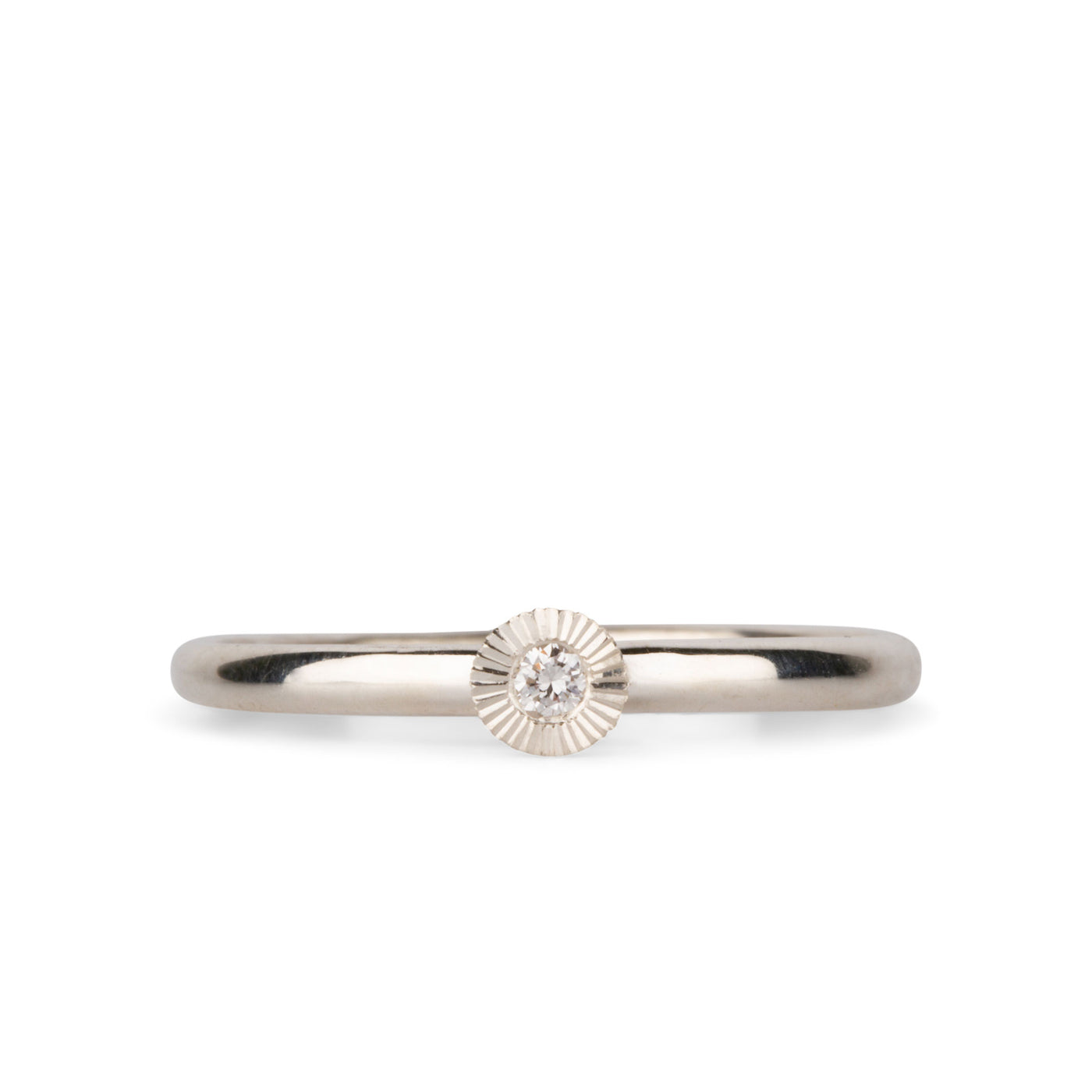 sterling silver small aurora stacking ring with a 2mm center diamond and engraved border