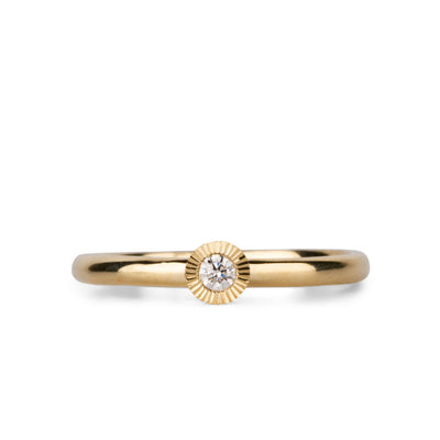 14k yellow gold medium aurora stacking ring with a 2.5mm center diamond and engraved border