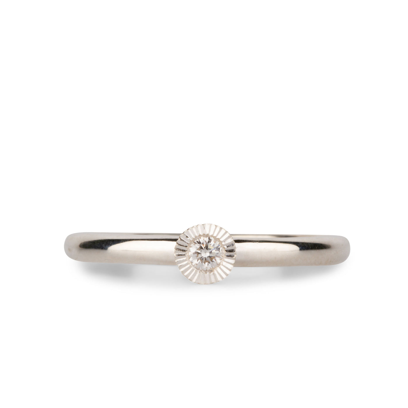 sterling silver medium aurora stacking ring with a 2.5mm center diamond and engraved border