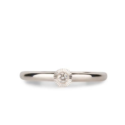 sterling silver medium aurora stacking ring with a 2.5mm center diamond and engraved border