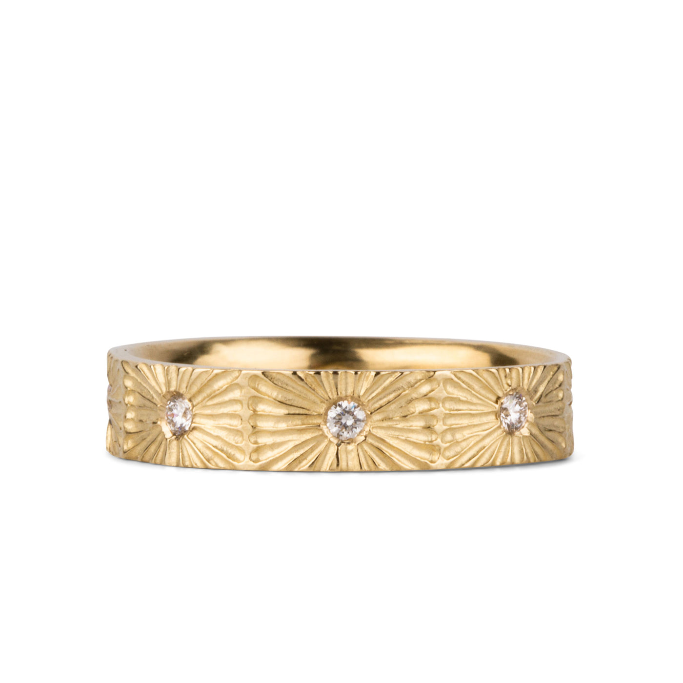 Nova sunburst eternity band with 8 flush set diamonds and carved texture around the outside in 14k yellow gold