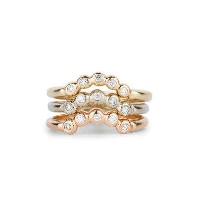 Arched Droplet Bands in Yellow, white, and rose Gold with White Diamonds by Corey Egan