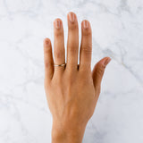 Blue Ridge hammered half round band on a hand by Corey Egan