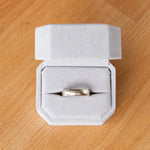 Blue Ridge half round wide white gold wedding band in a ring box