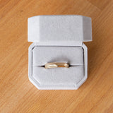 14k yellow gold Denali chunky faceted wedding band in a ring box