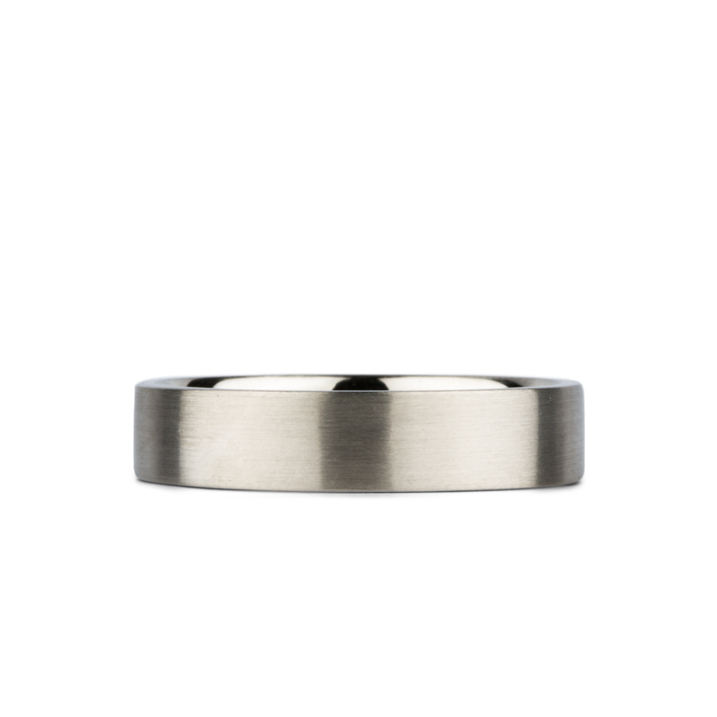 5mm Wide Diablo flat brushed white gold wedding band on a white background by Corey Egan