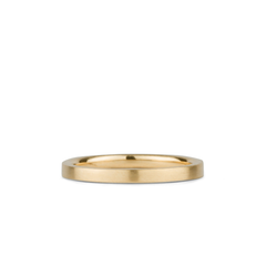 Thin 2mm Diablo flat brushed yellow gold wedding band on a white background by Corey Egan