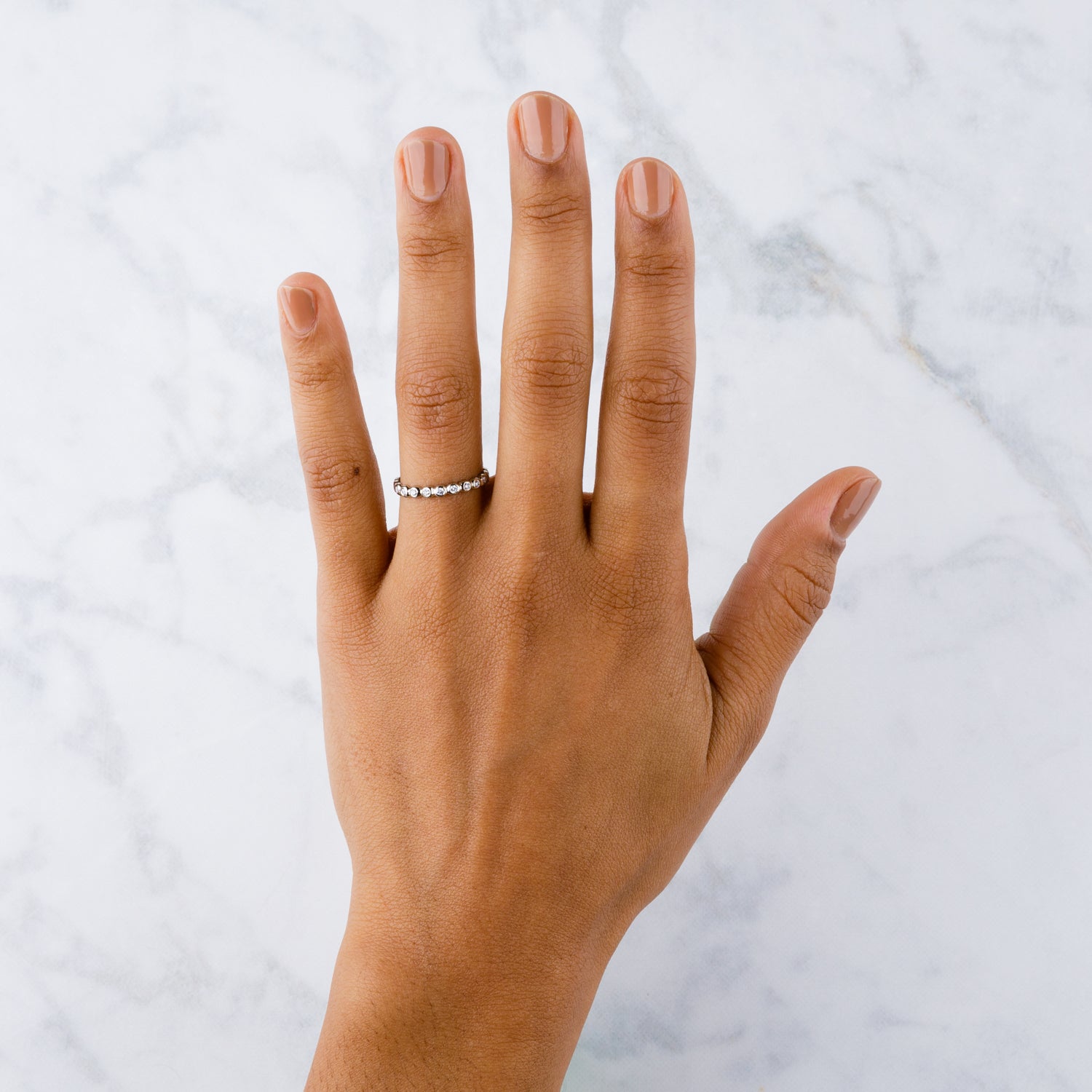 White Diamond Droplet Band in Yellow Gold on a hand | Corey Egan