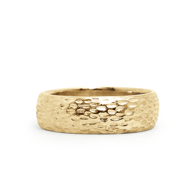 Lobos carved surface half-round wedding band in 14k yellow gold. 