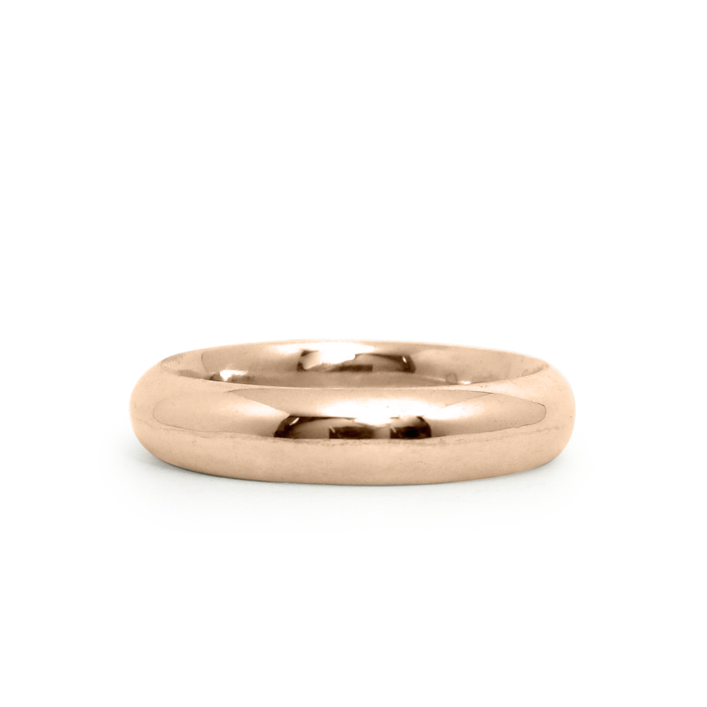 14k rose gold half round Muir Band by Corey Egan on a white background