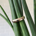 Shiny half round wide Muir wedding band in 14k yellow gold