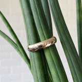 Shiny half round wide Muir wedding band in 14k yellow gold