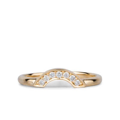 14k Yellow gold small pave diamond arch band on a white background