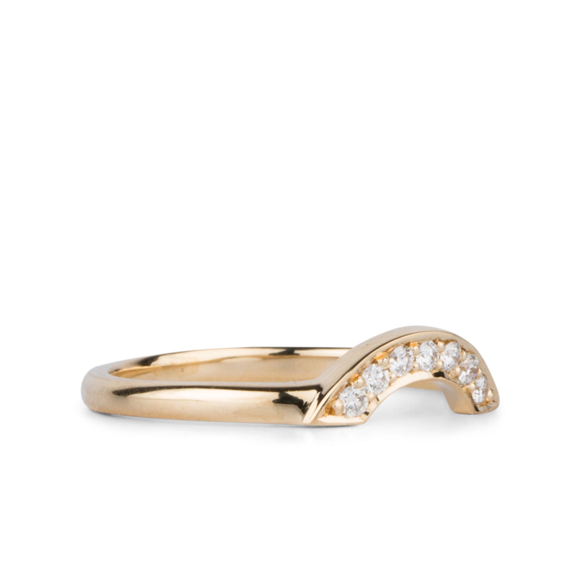 side view of 14k Yellow gold small pave diamond arch band
