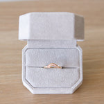 14k yellow gold small pave diamond arch band in a ring box