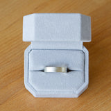 14k white gold 5mm wide Yosemite band in a ring box