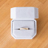 3mm Yellow gold Yosemite half round stippled texture wedding band in a ring box