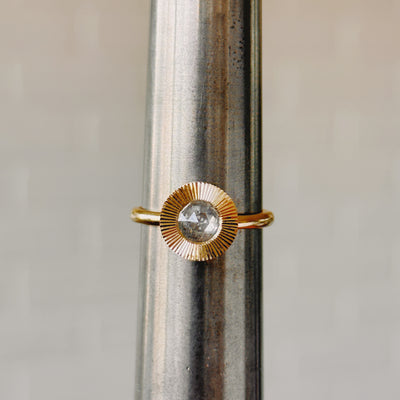 Icy Rose Cut Diamond Aurora Ring front angle on a metal ring sizer