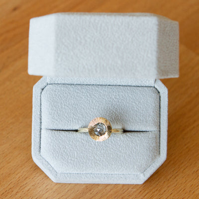 Salt & Pepper Rose Cut Diamond Aurora Ring packaged in a ring box