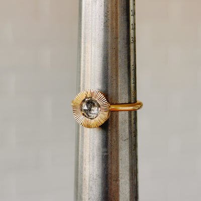 Salt & Pepper Rose Cut Diamond Aurora Ring side angle on a metal ring sizer 