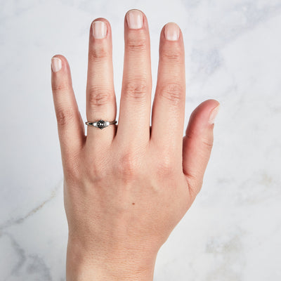 Hexagon Salt and Pepper Rose Cut Diamond Lenox Ring in 14K White Gold on a hand | Corey Egan