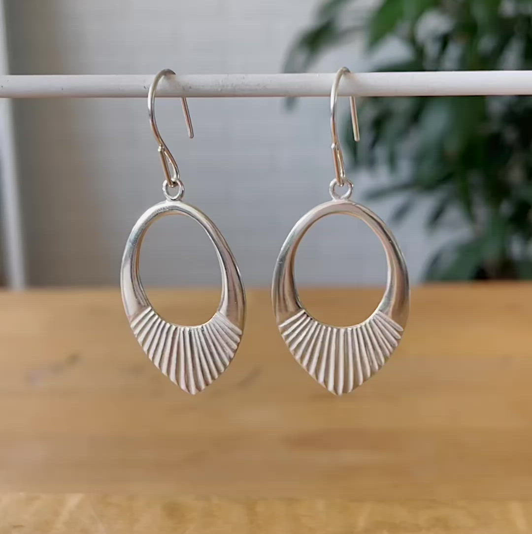 Silver Medium open petal shape earrings with textured bottoms