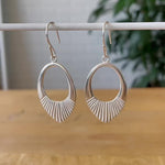 Silver Medium open petal shape earrings with textured bottoms