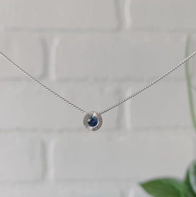 Sterling silver small aurora necklace with a blue Montana sapphire center 